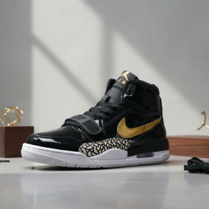 Nike Black Gold High Top Sneakers